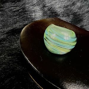 Blue and green striped glass ring.